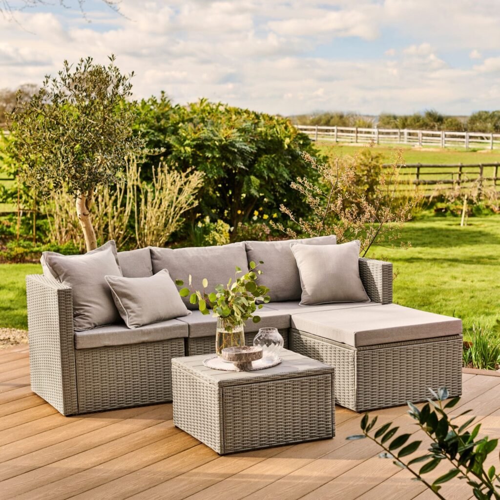 Garden corner sofa set with cushions on a sunny patio